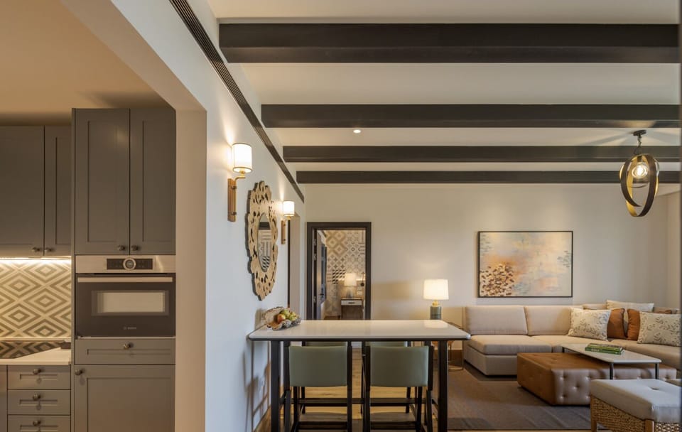 Gather comfortably in the airy open-plan lounge and dining area.