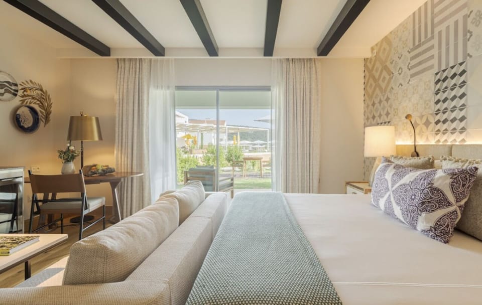 Wake slowly to soft daylight and garden terrace just outside.