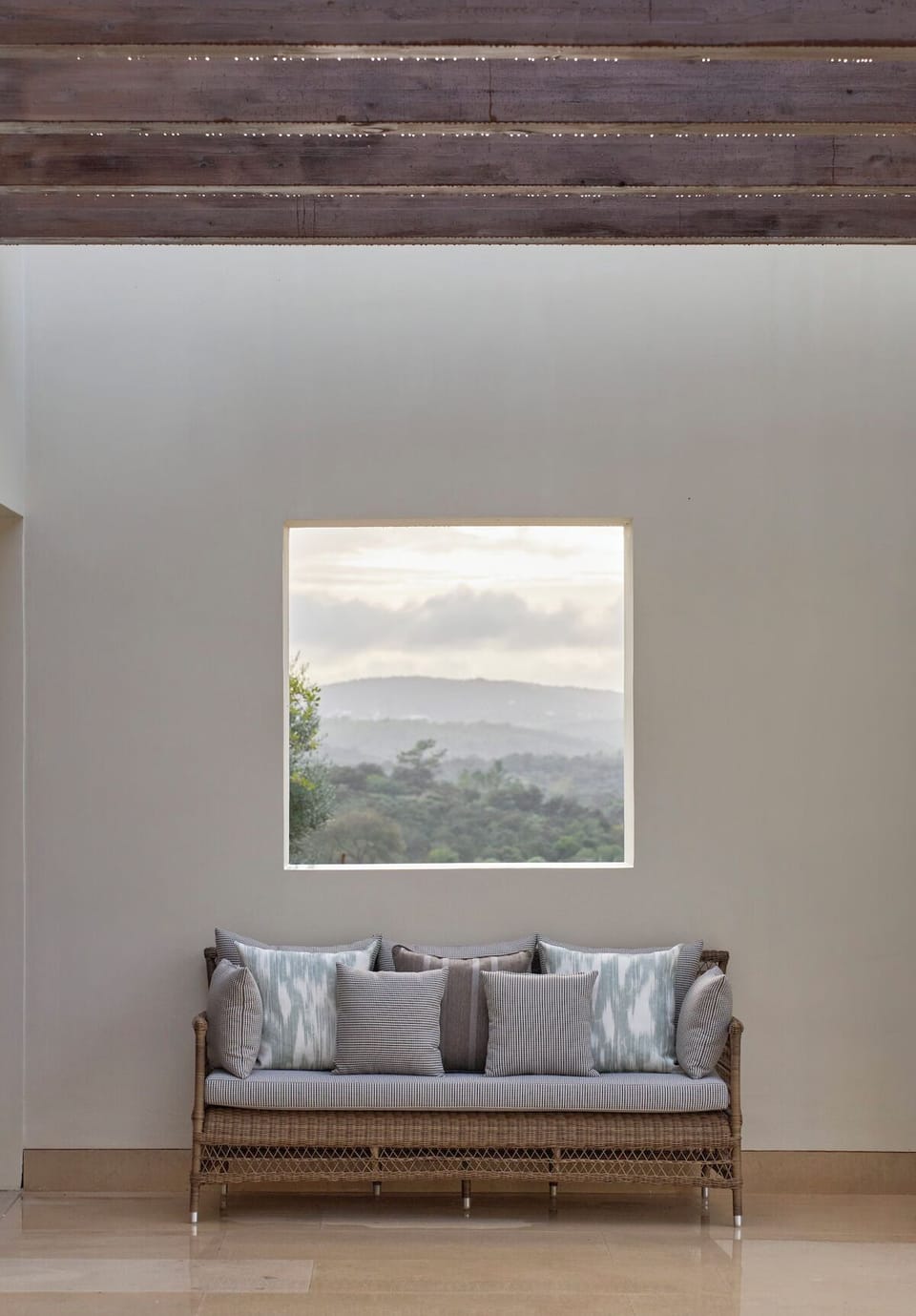 Stroll through calm, design-forward interiors with warm ambient glow.