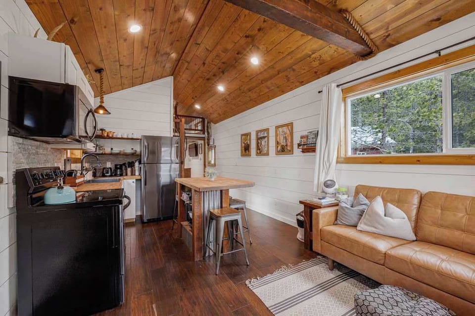 Fully stocked kitchen with island and seating.
