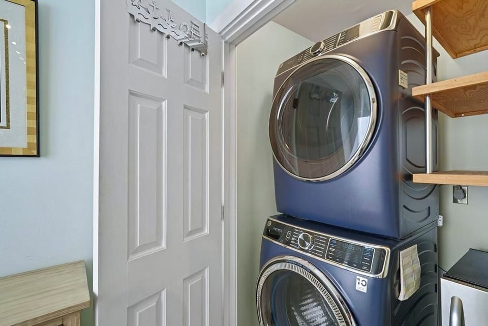 Main House 1st Floor - Convenient laundry room with washer and dryer available for guest use, perfect for refreshing beach towels and clothes during your stay.