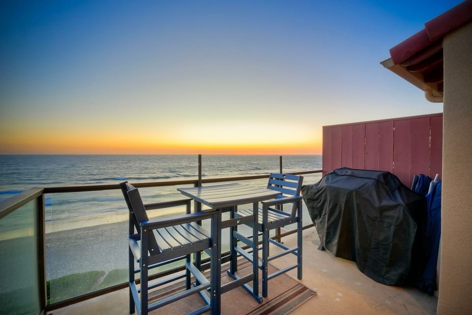 Sunset cocktails on your private oceanfront balcony