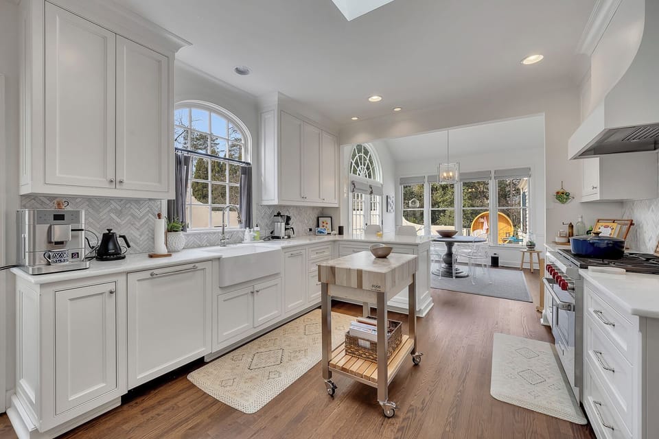 Large quartz countertops & center island ideal for cooking, prep, and casual dining