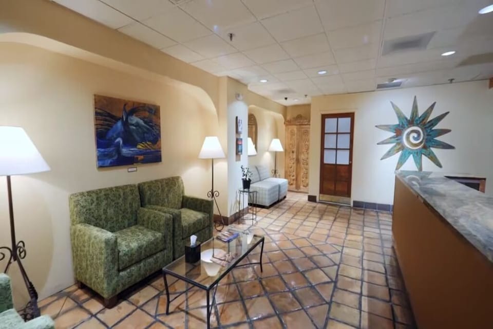 Settle into a calm lobby nook with soft lighting and seating