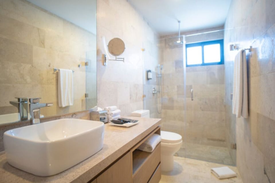 Refresh in a spa-like bathroom with a roomy walk-in shower.