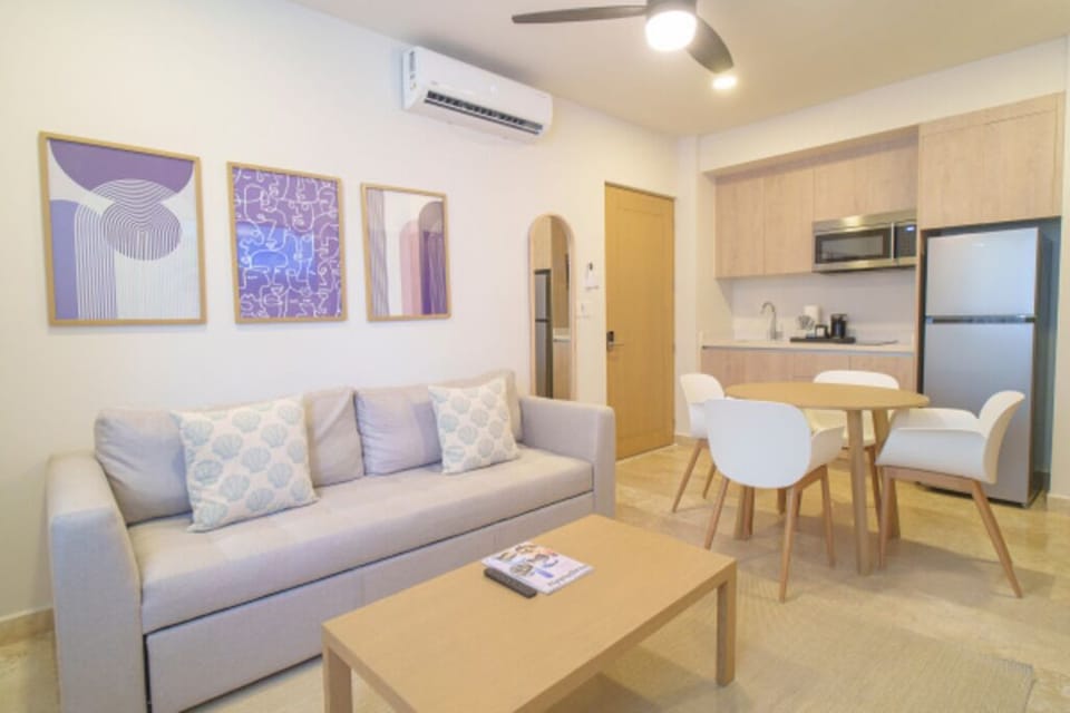 Settle into airy open-plan living with easy dining.