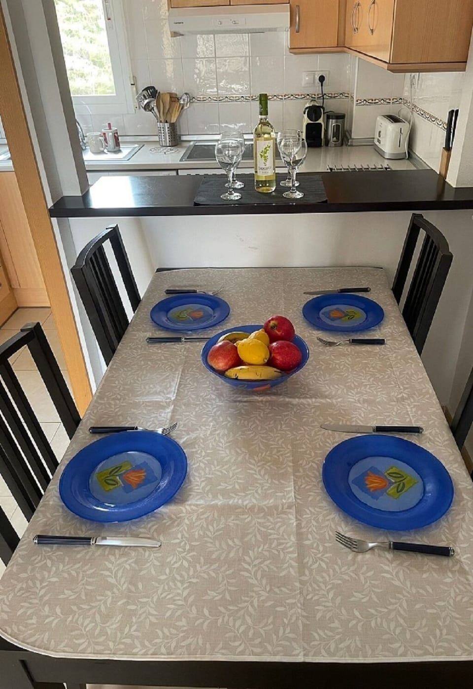 Contemporary Dining setup for four guests, more outside