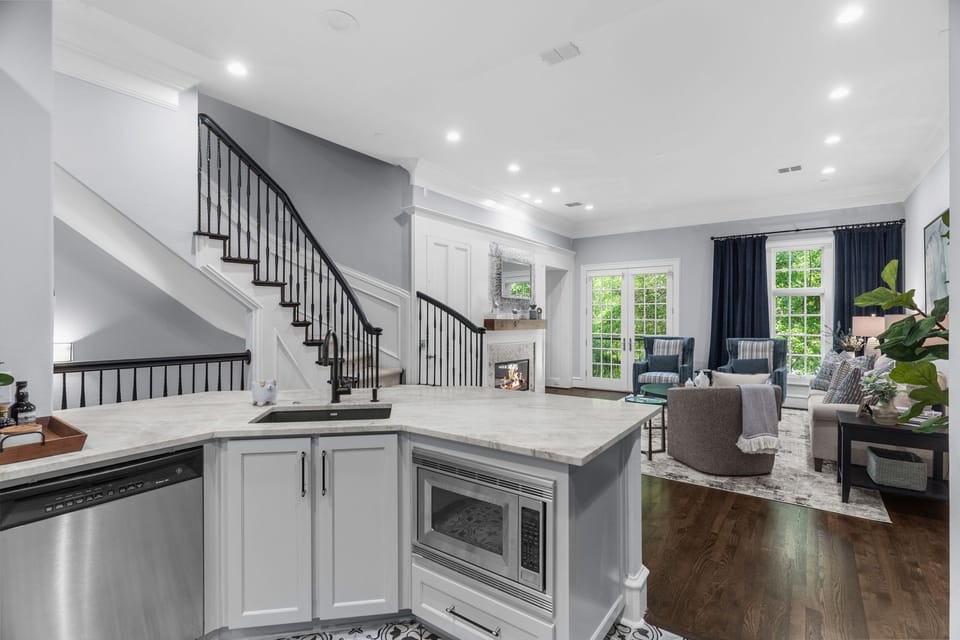 Elegant culinary space with seamless access to the living and dining areas.
