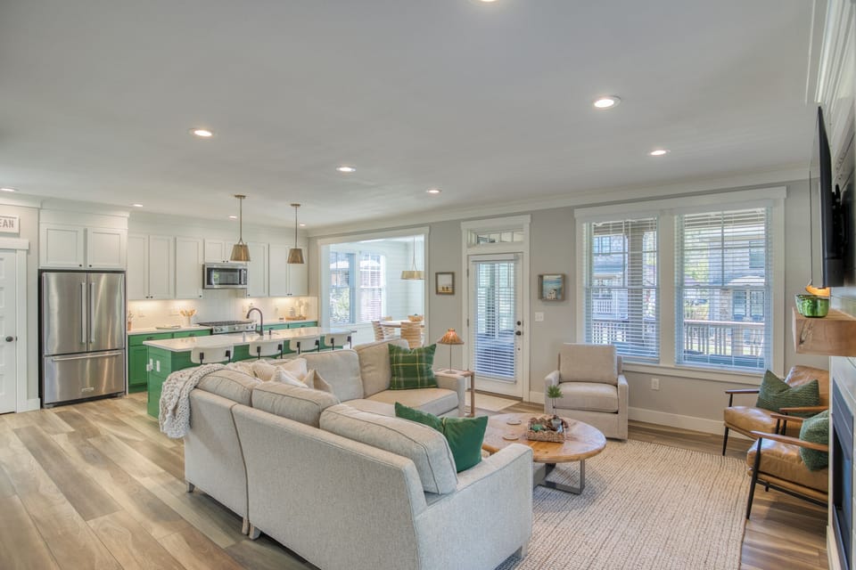 The main floor of the home is an open floor plan from the living room, dining ro