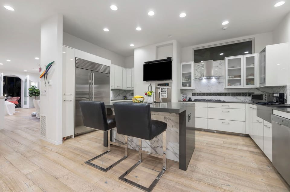 Chef’s kitchen featuring a full suite of premium appliances.
