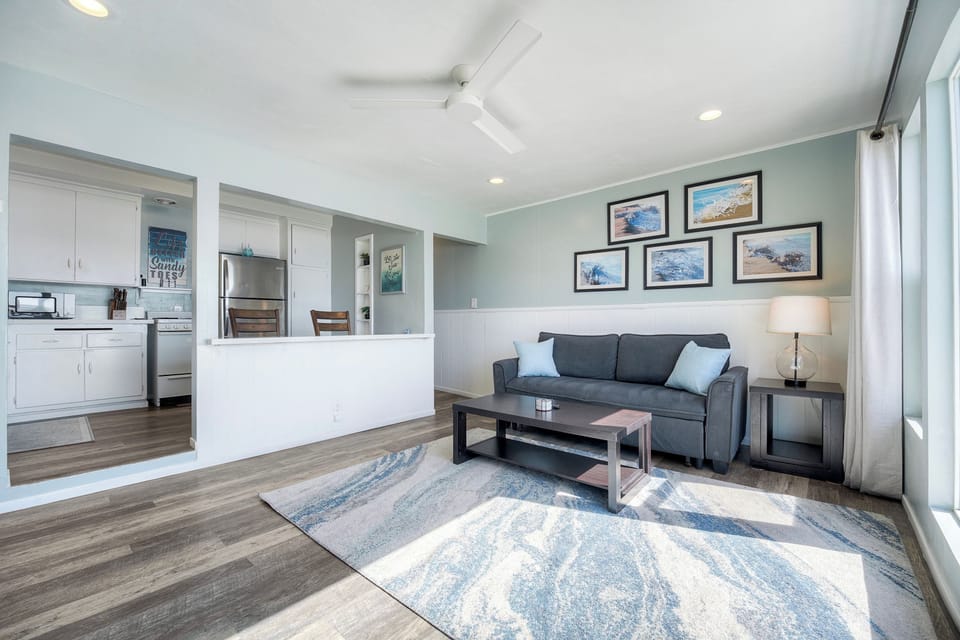 Open living area connecting to kitchen & sofa bed for extra sleeping space