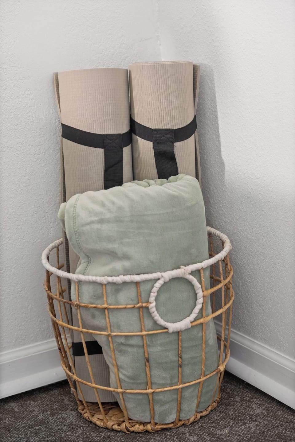 Extra blankets and yoga mats for relaxing or stretching.