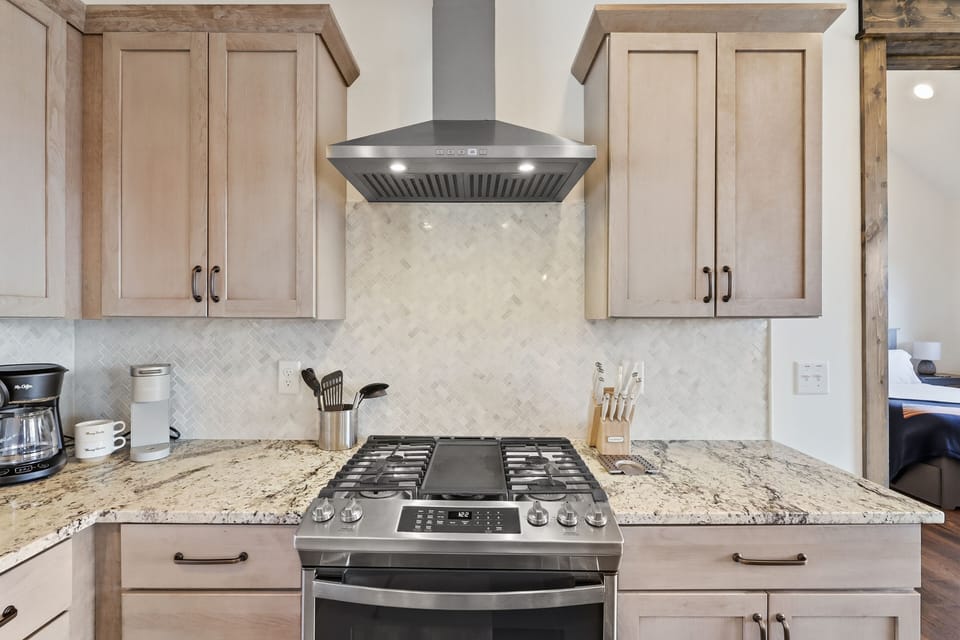 Stainless appliances and granite counters for easy meal prep