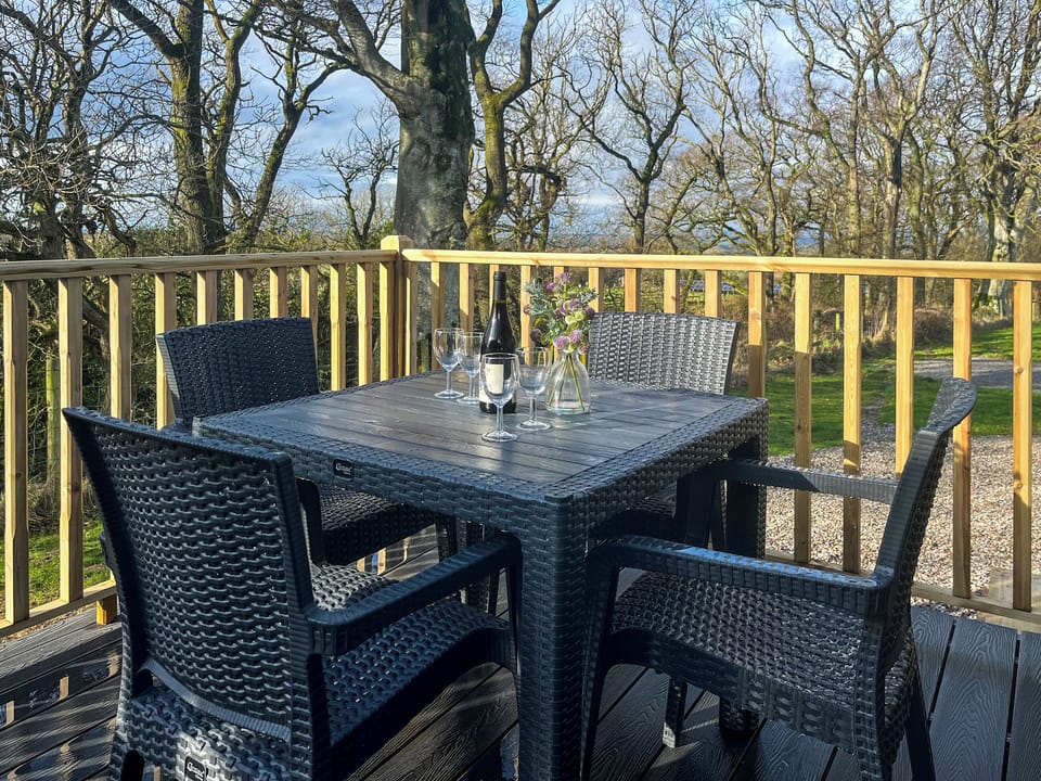 Sitting-out-area | Herdwick Lodge - Wallace Lane Farm Cottages, Brocklebank, near Caldbeck and Uldale