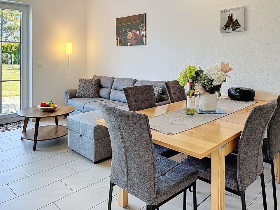 Furniture, Interior Design, Flooring, Floor, Wood, Table, Couch, Chair, Kitchen & Dining Room Table, Dining Room