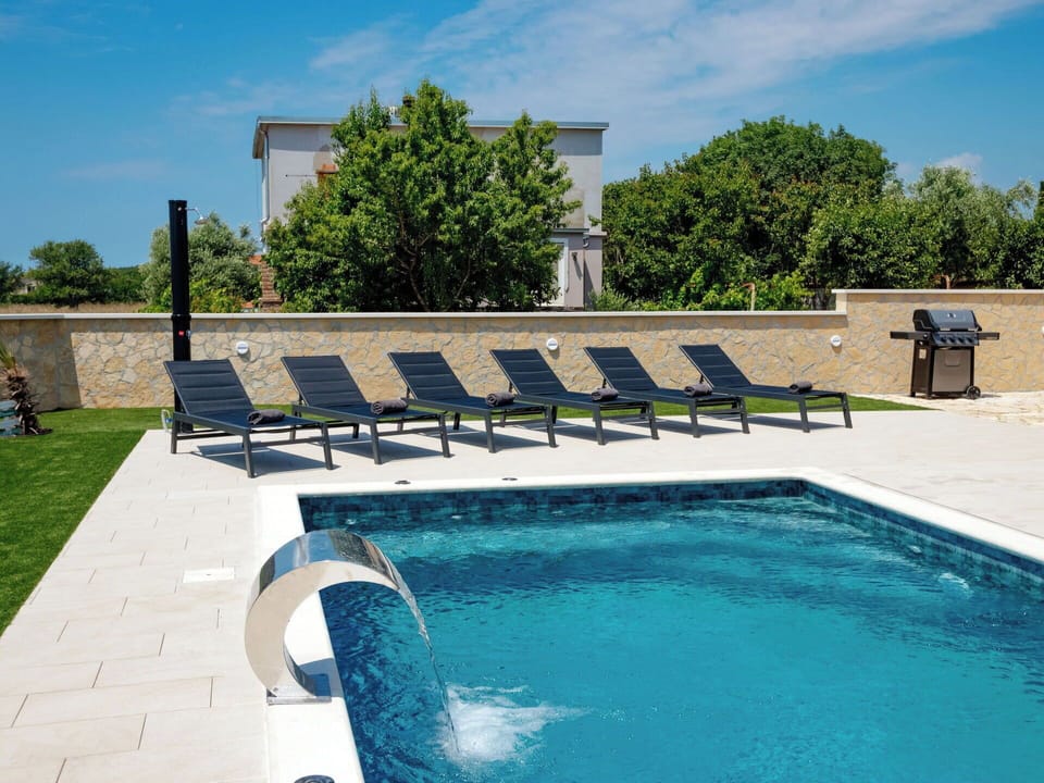 Swimming Pool, Water, Outdoor Furniture, Resort, Sunlounger, Composite Material, Water Feature, Shade, Eco Hotel, Leisure