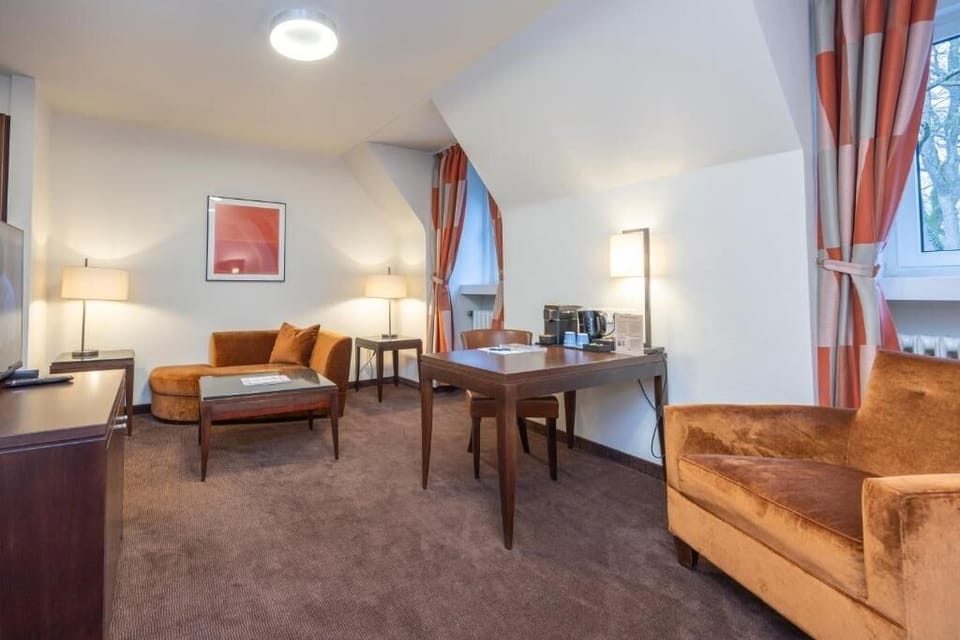 Sip coffee by the window and lounge in soft armchairs.
