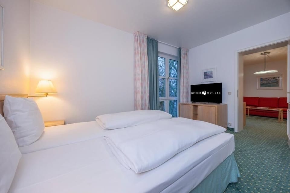 Drift off in a bright room framed by tall, peaceful windows.
