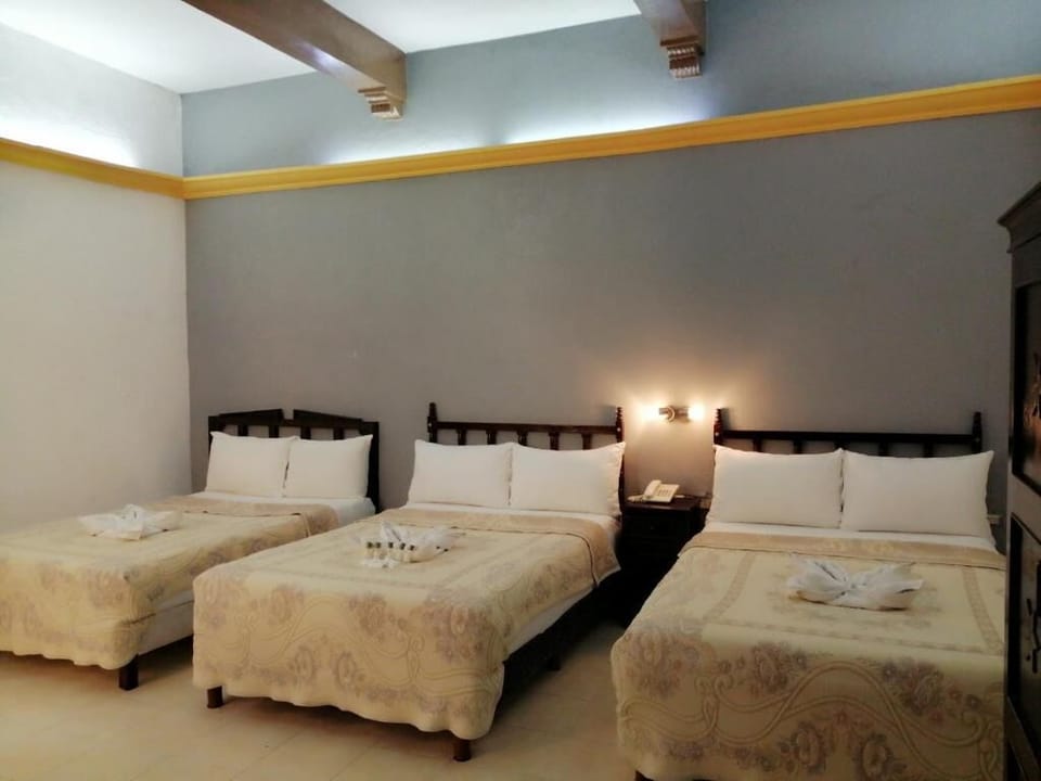 Settle in together with multiple beds and cozy linens.