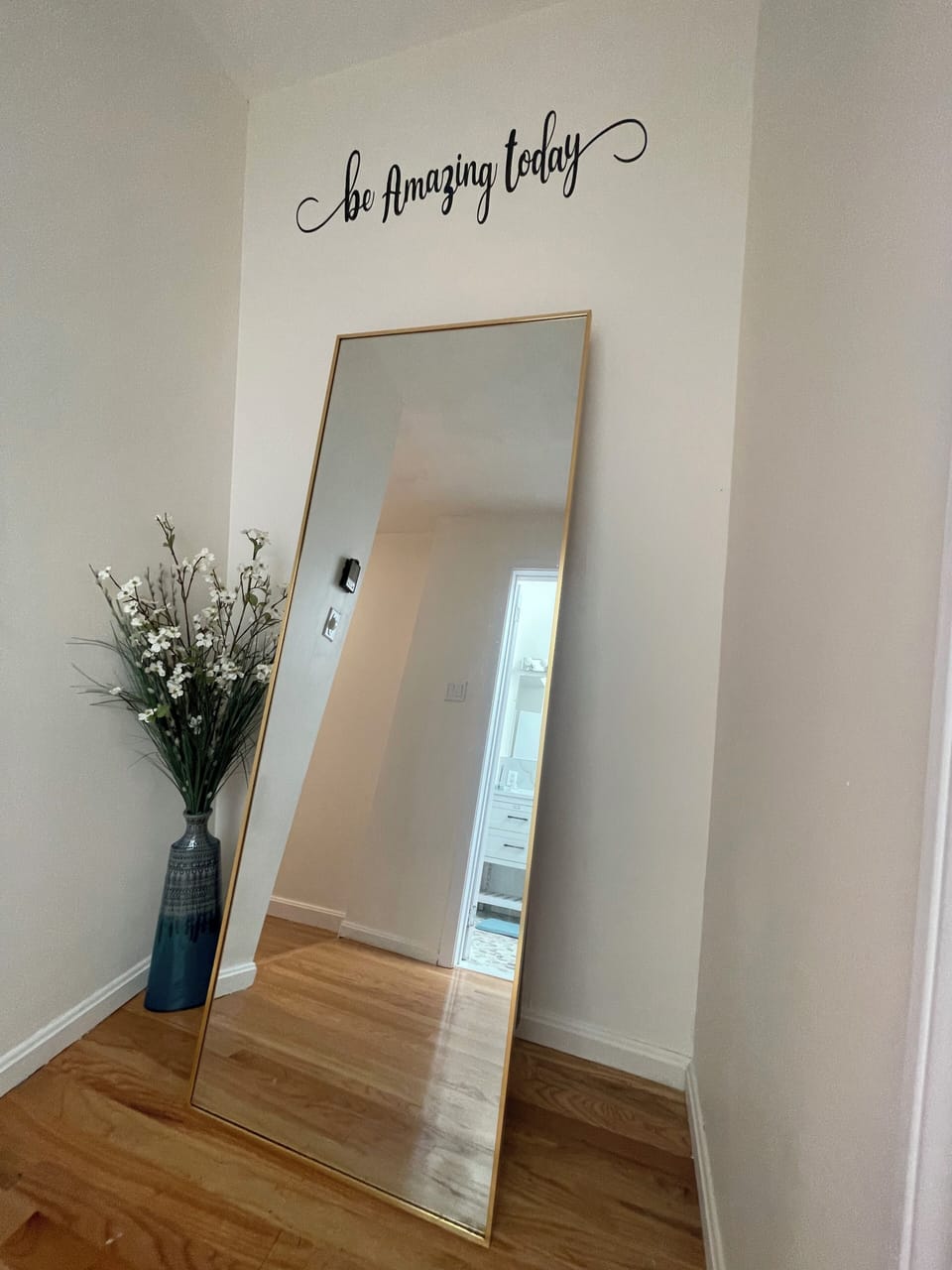 Full length mirror, perfect for getting ready before heading out.