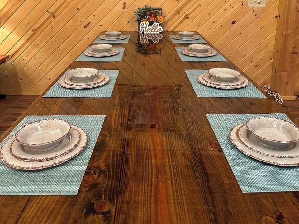 Dining table seats 8. With the kitchen bar seating an additional 3 people.