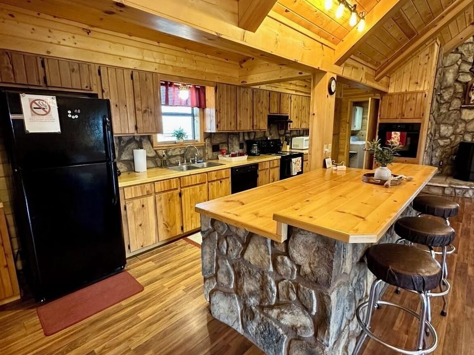 Fully stocked kitchen with everything you would need to prepare a meal.