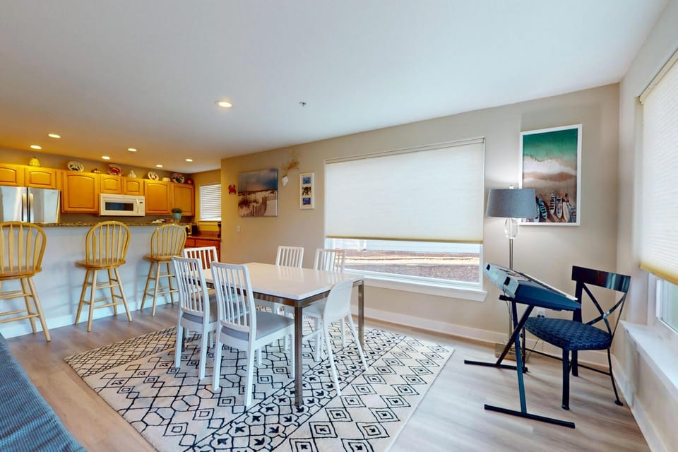 Bright dining area with natural light.