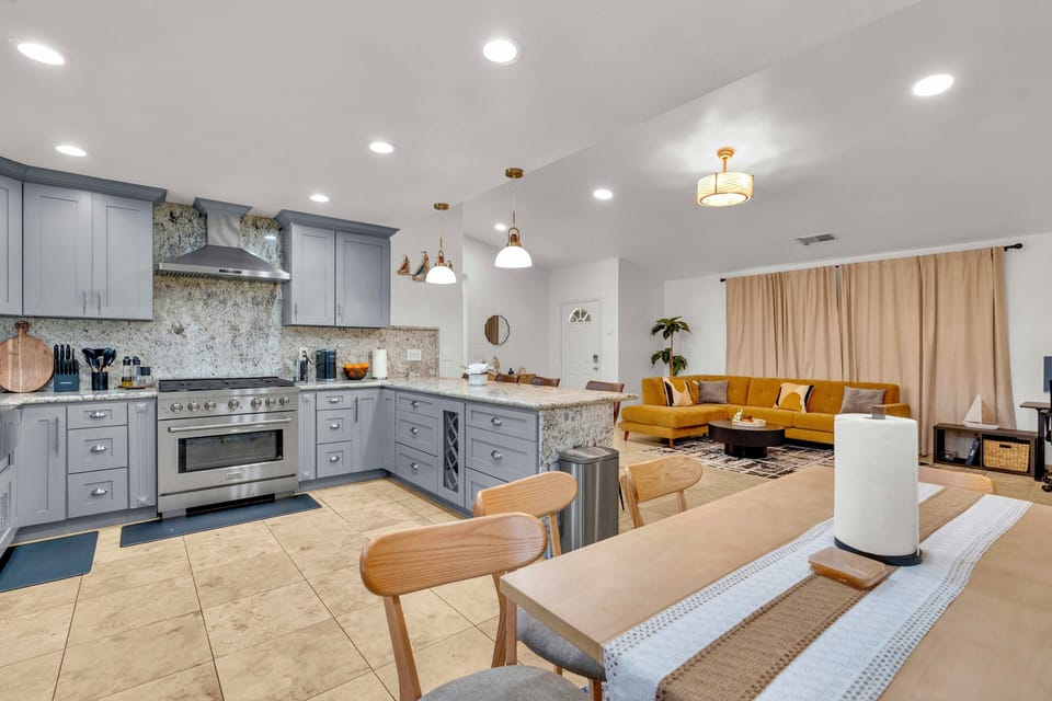 Modern living space with open kitchen, bright and ideal for family time together