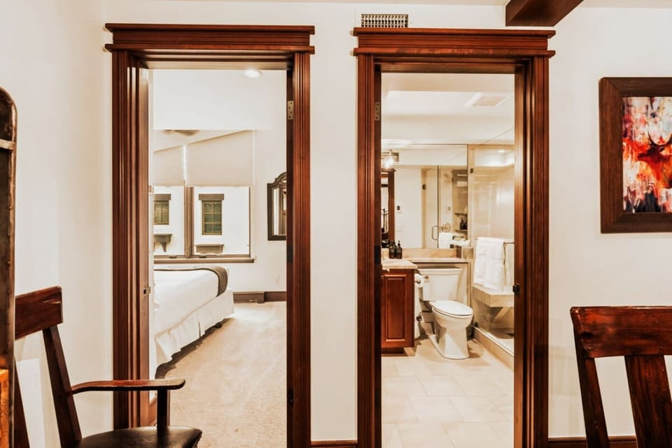 Full bathroom with walk in shower, adjacent to the dining room and bedroom #4