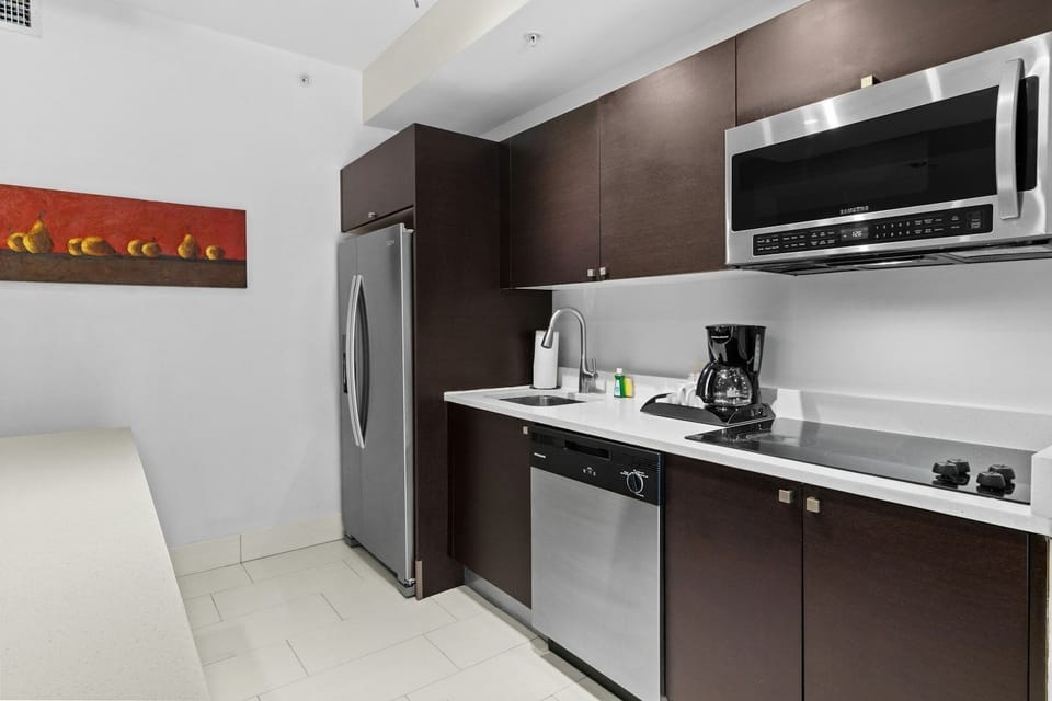 Spacious kitchen with modern appliances perfect for home-cooked meals.