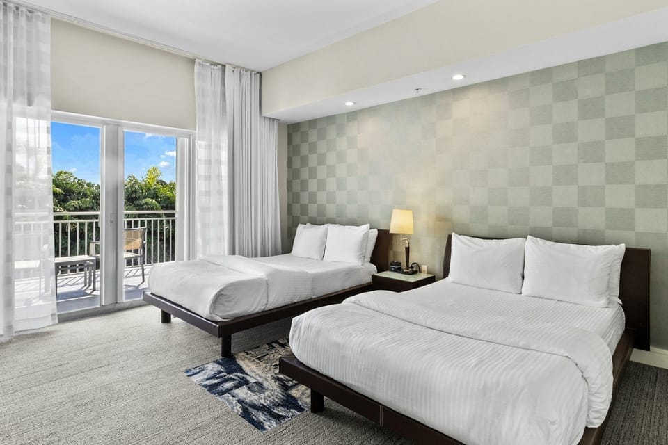 Cozy bedroom highlighting the villa’s contemporary design and plush beddings.
