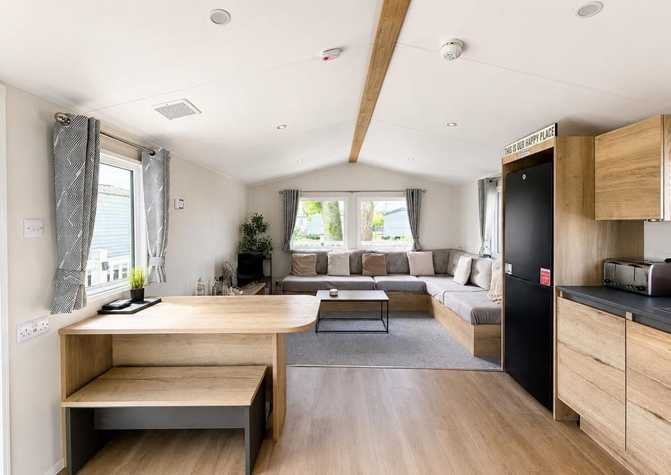 The dining table seating four people is the ideal place to enjoy a meal together, after dinner grab the board games and plan a fun games night in.