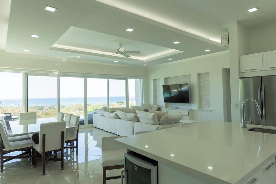 Open concept family room with ocean view