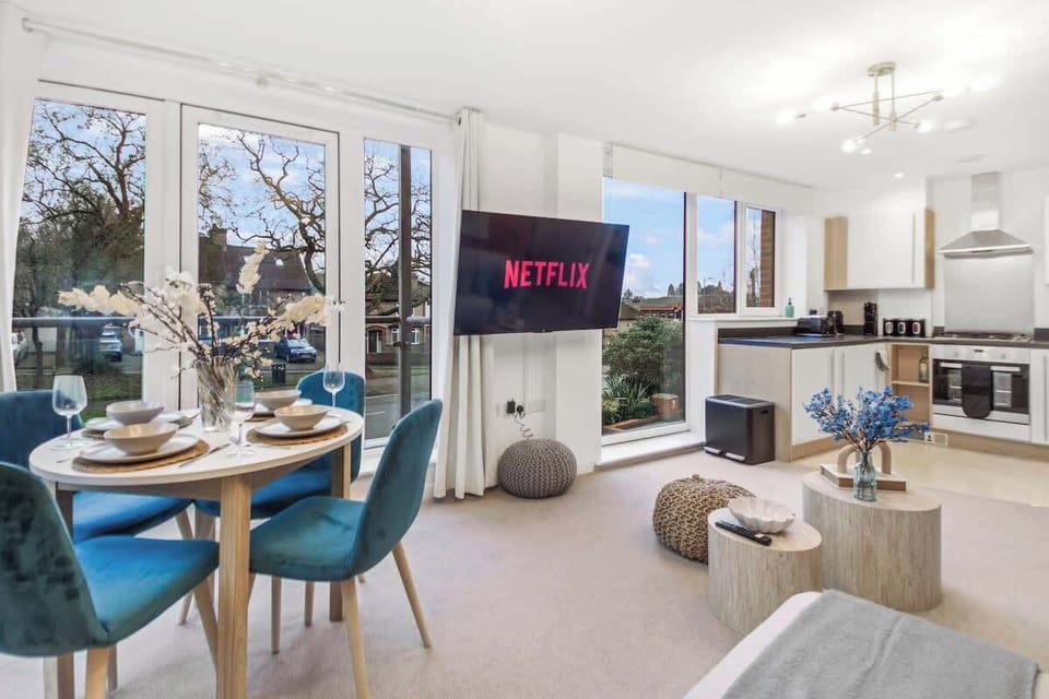 Dining Area: A bright space by the windows, perfect for enjoying meals together.