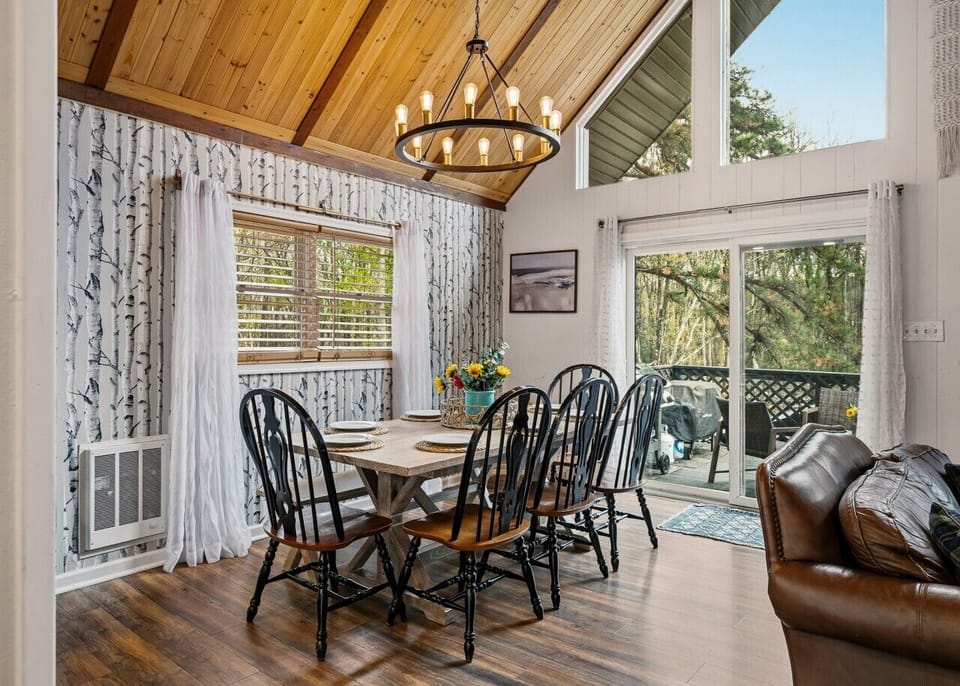 Dining Area | Chandelier & Wooden Table | Sliding Glass Door