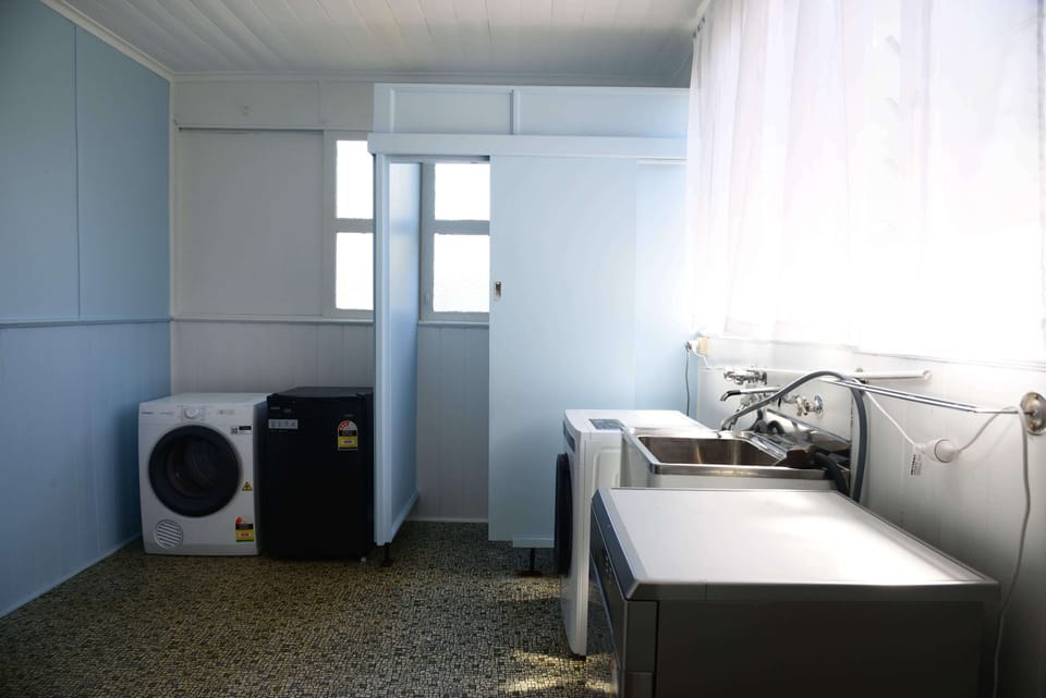 Laundry with washer, dryer and dishwasher 