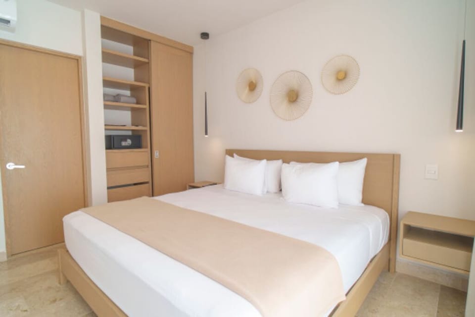 Drift into crisp linens and a calm, modern retreat.