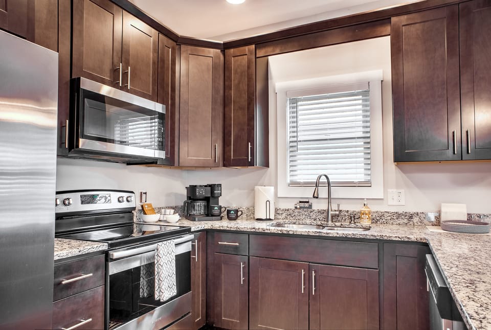 Kitchen is outfitted with an electric range