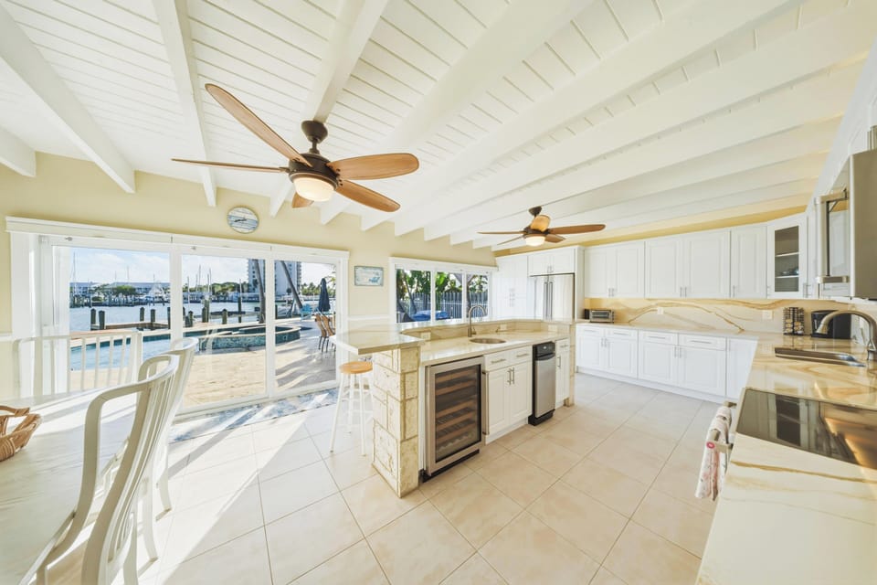 Fully equipped kitchen in a luxury Marathon Florida vacation home with canal access, perfect for preparing fresh seafood after a day on the water.