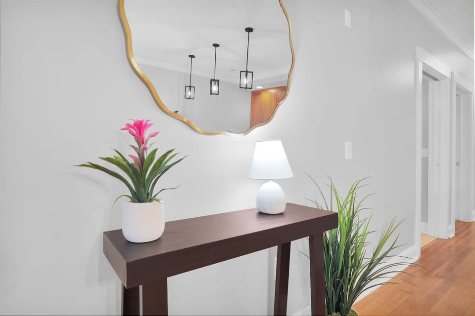 Charming decor in the living area. (Deluxe 2-Bedroom Unit)