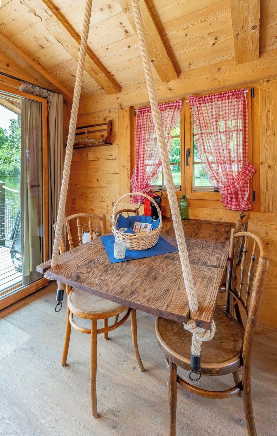 Cozy dining corner with wooden interior and natural light