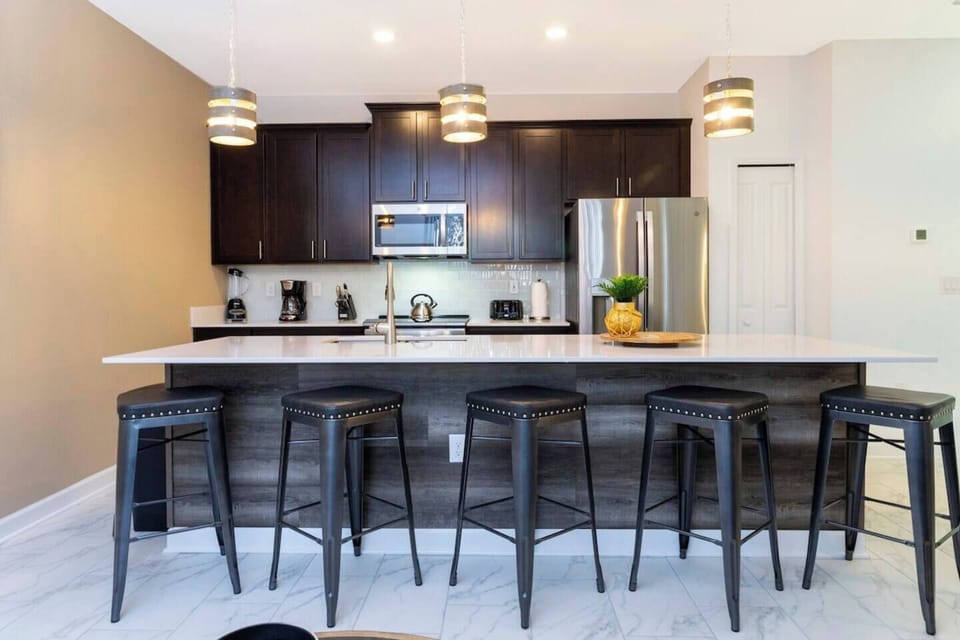 Fall in love for modern luxury with our stunning open kitchen—a beautiful, vibrant space that seamlessly combines style and functionality. a family-friendly retreat where the joy of cooking meets the warmth of togetherness.