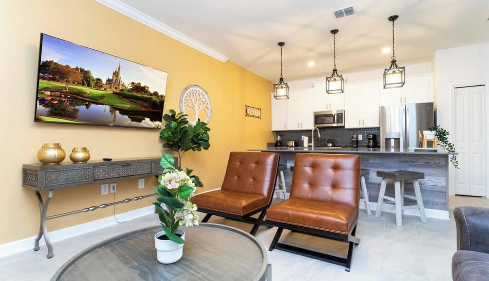 Open living space that seamlessly connects the kitchen and dining area, offering a perfect blend of comfort and style.