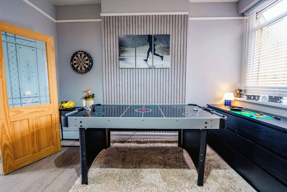 Games Room with Air Hockey, Darts & Roulette and Sofa Bed