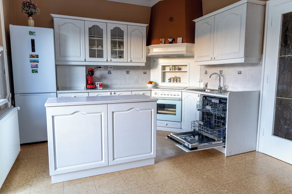 Fully equiped kitchen with AC with terrace exit and relaxing garden views