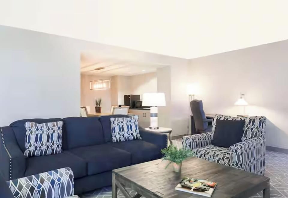 Lounge comfortably on plush seating after a full day.