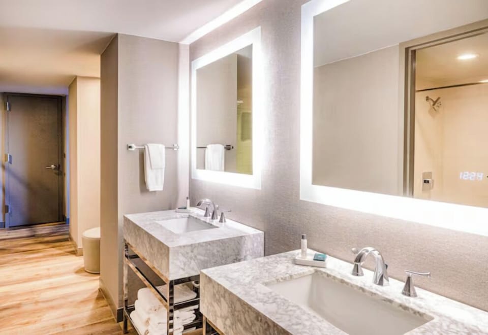 Refresh each morning at a glowing double-vanity oasis.