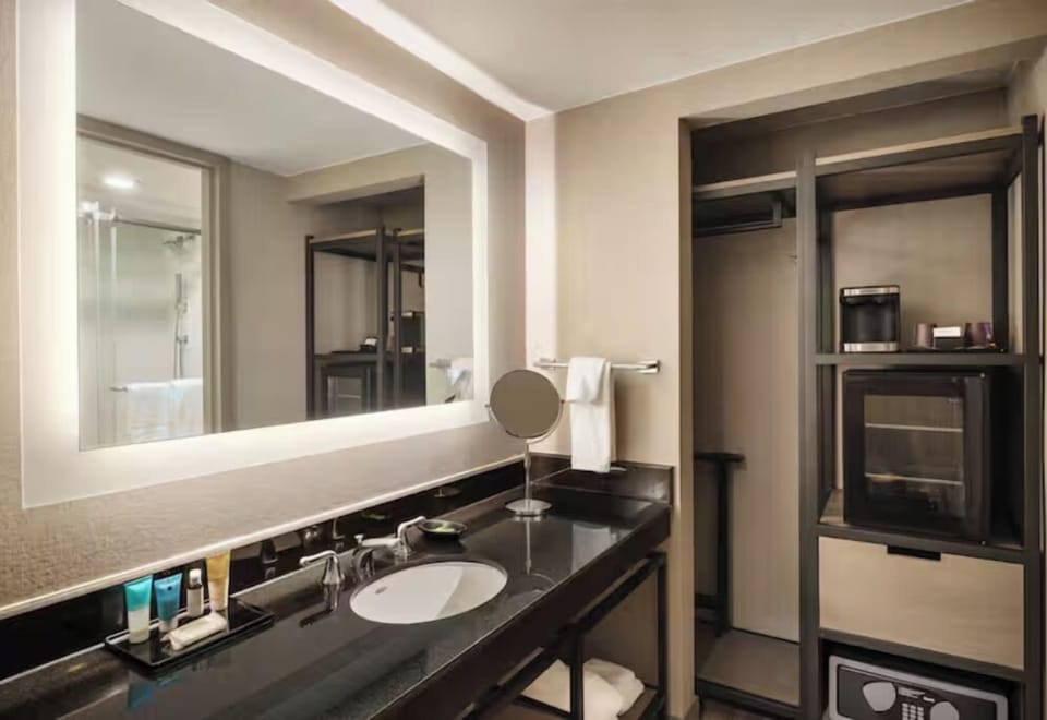 Refresh at the bright vanity with generous counter space.
