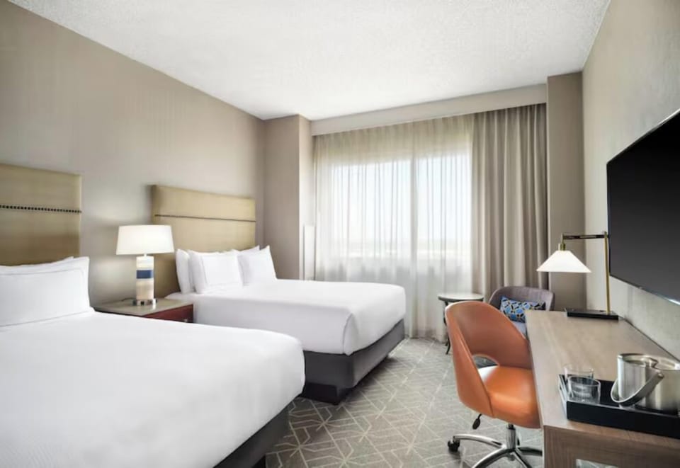 Arrive and unwind in a calm room with double beds.