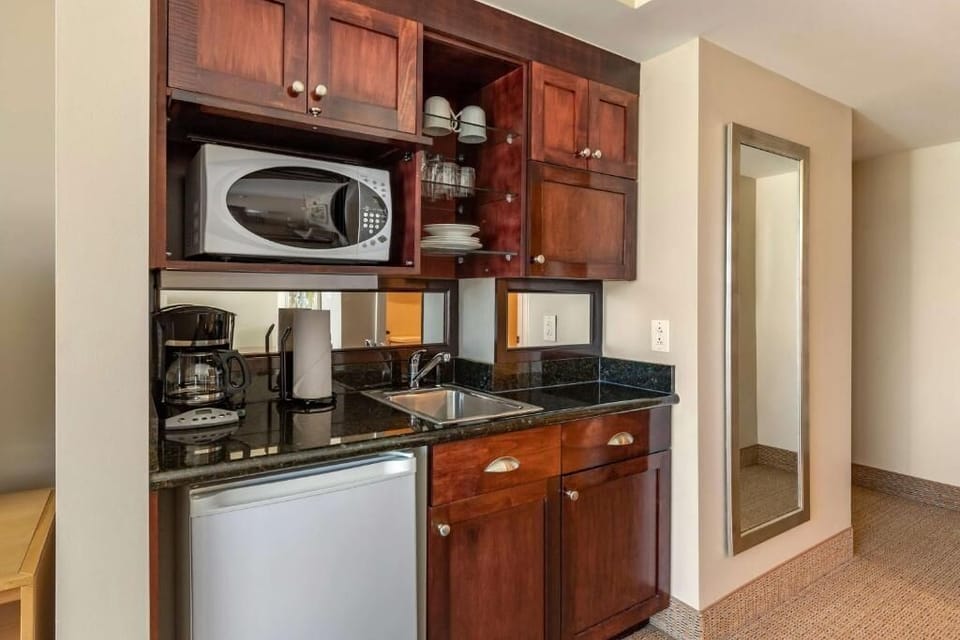 Enjoy easy snacks and coffee anytime with handy kitchenette.